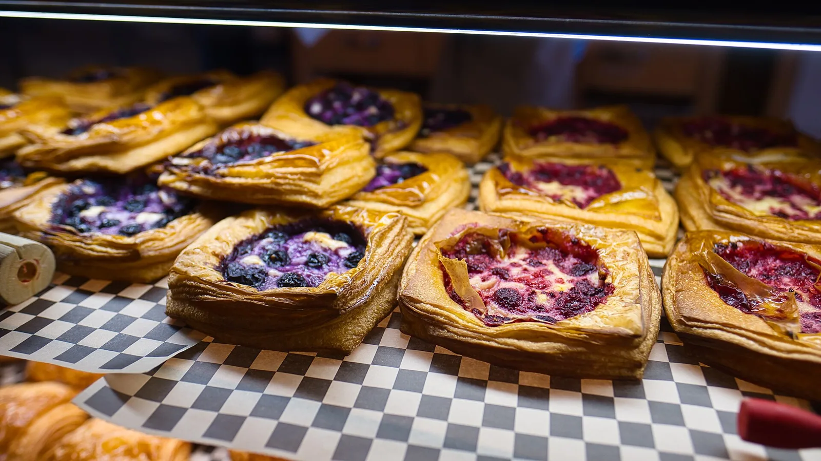 Pastries on display in a bakery case. The photo was not taken in Orlando.