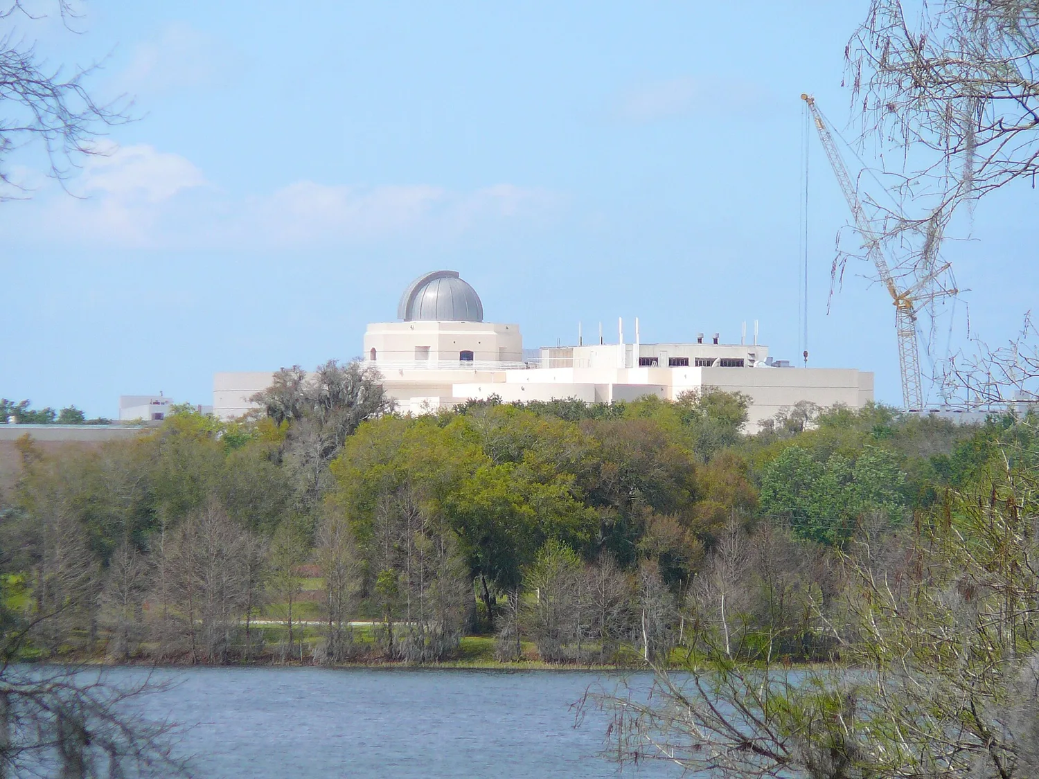 The Orlando Science Center and its observatory dome, seen across the water in Loch Haven Park