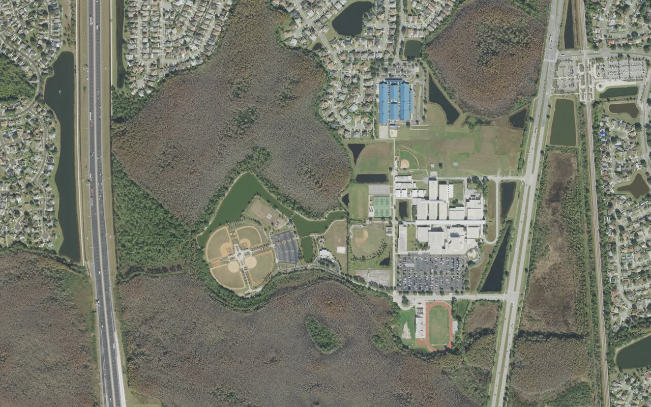 Cypress Creek High School's campus (right of center) and the neighborhood around it on Bear Crossing Drive in Orlando, seen from the air
