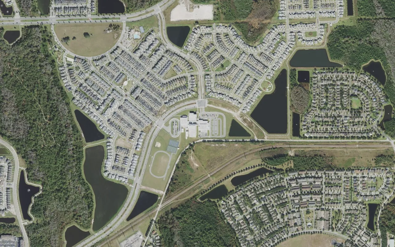 Innovation Middle School's campus (center) and the neighborhood around it on Storey Park Boulevard in Orlando, seen from the air
