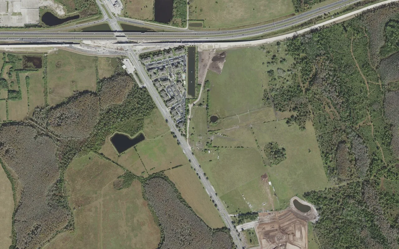 Mater Academy Narcoossee's campus (center) and the neighborhood around it on Academy Drive in Orlando, seen from the air