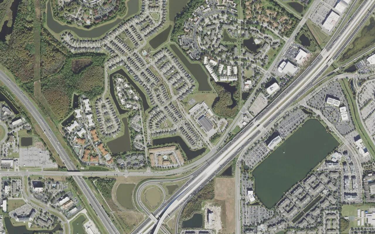 Millennia Elementary School's campus (center) and the neighborhood around it on Cypress Creek Boulevard in Orlando, seen from the air