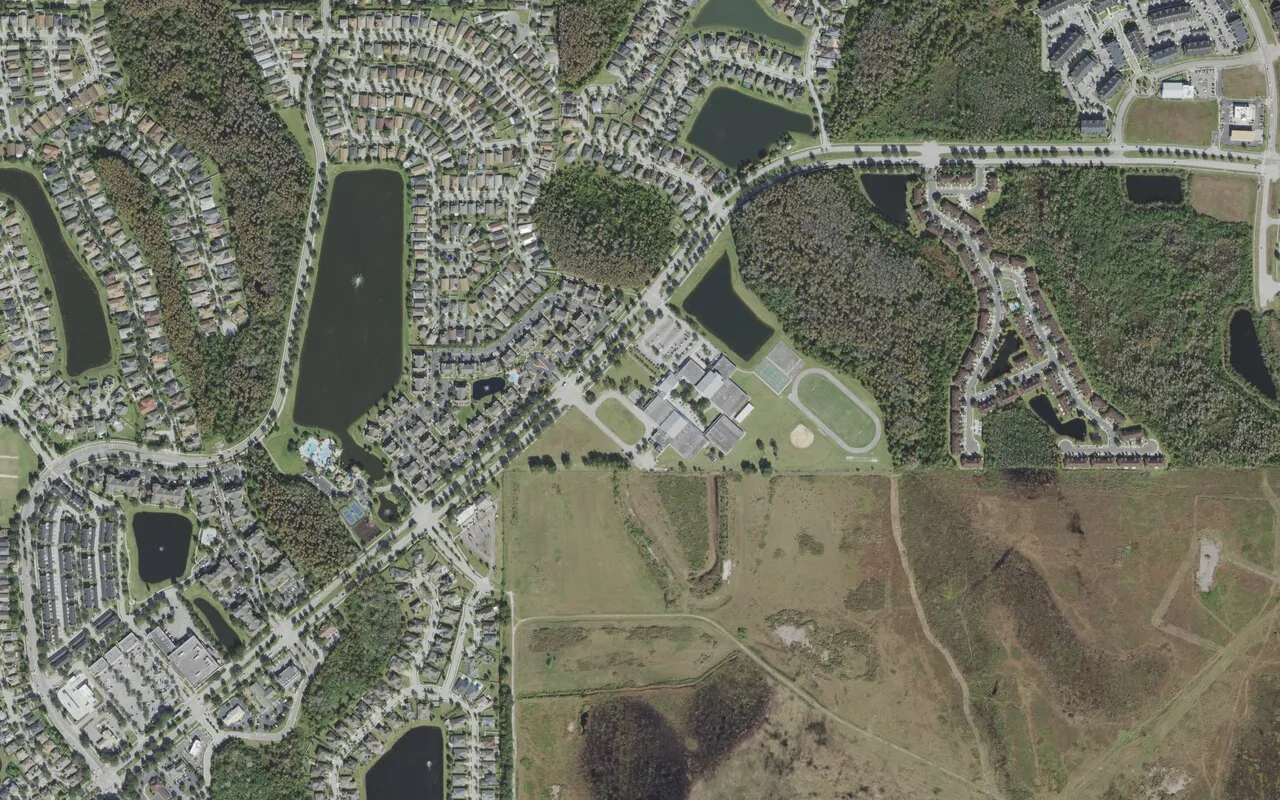 Odyssey Middle School's campus (center) and the neighborhood around it on Lee Vista Boulevard in Orlando, seen from the air