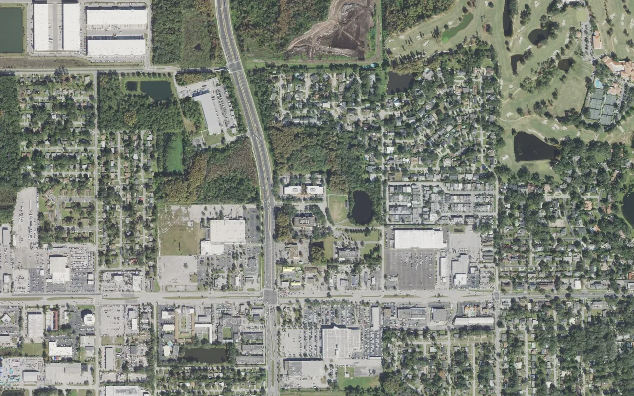 Orlando Science Elementary Charter's campus (center) and the neighborhood around it on Technology Drive in Orlando, seen from the air