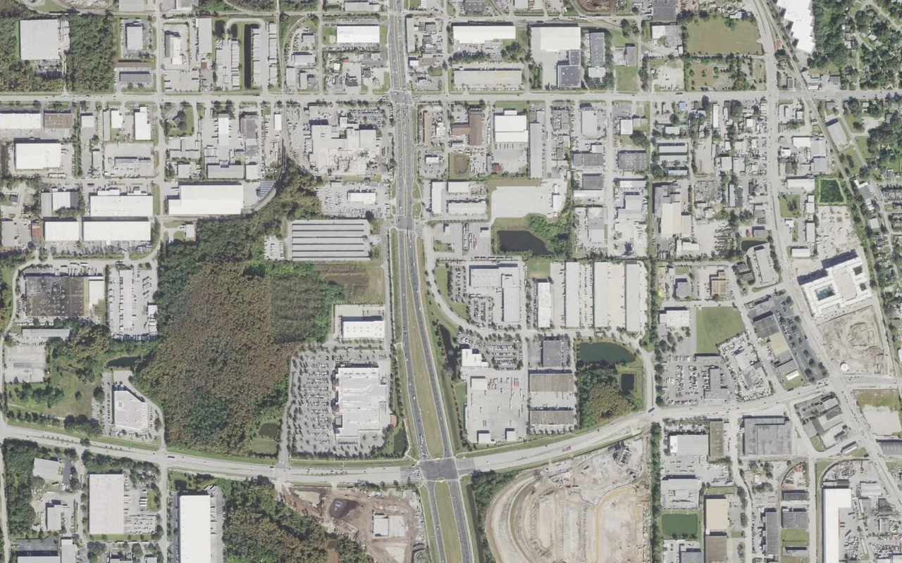 Orlando Science Middle High Charter's campus (center) and the neighborhood around it on Lynx Lane in Orlando, seen from the air