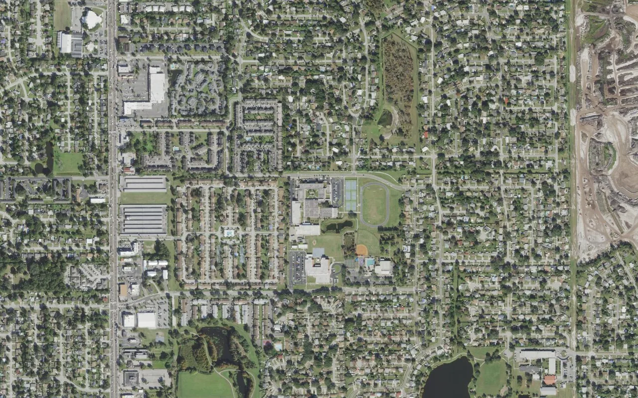 Roberto Clemente Middle School's campus (center) and the neighborhood around it on Roberto Clemente Road in Orlando, seen from the air