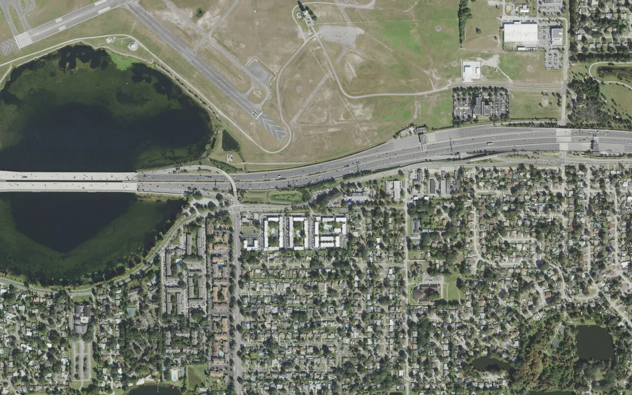 UCP Downtown Charter's campus (center) and the neighborhood around it on Lake Underhill Road in Orlando, seen from the air