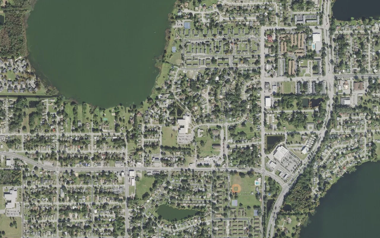 Washington Shores Elementary School's campus (center) and the neighborhood around it on West Lake Mann Drive in Orlando, seen from the air