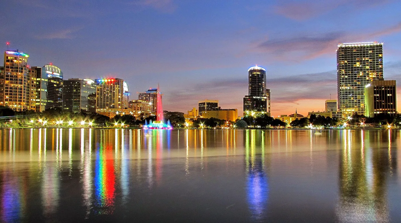 The downtown Orlando skyline reflected in Lake Eola at dusk