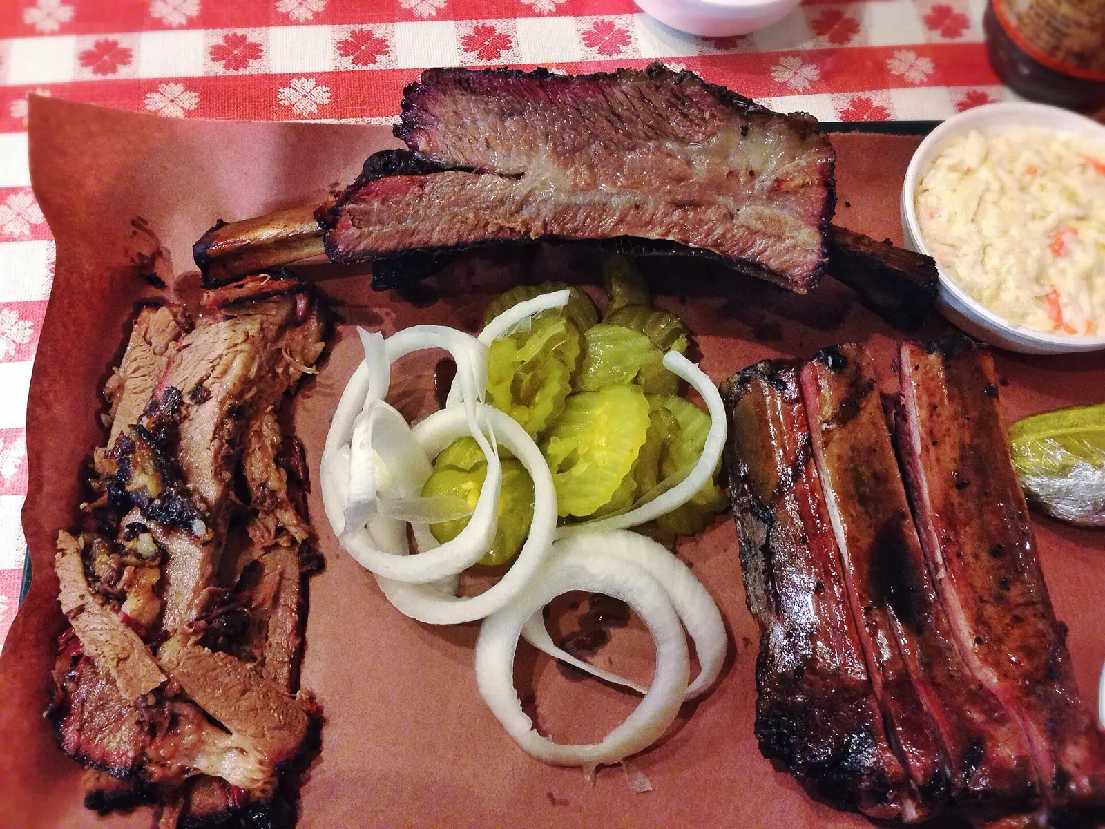 A barbecue plate of brisket, beef rib and pork ribs. The photo was not taken at an Orlando restaurant.
